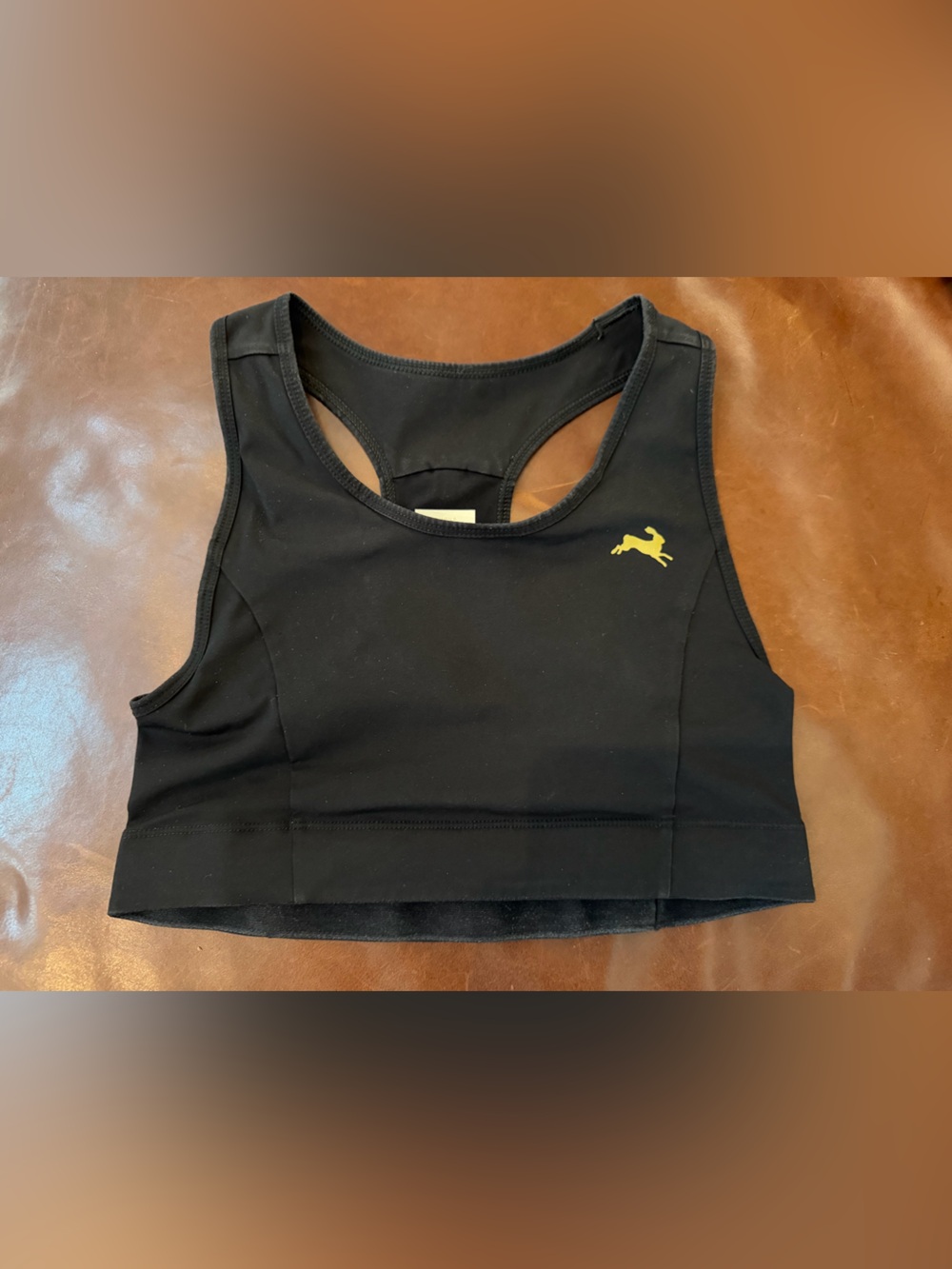Tracksmith Allston Black Cropped Racerback Sports Bra with front pocket